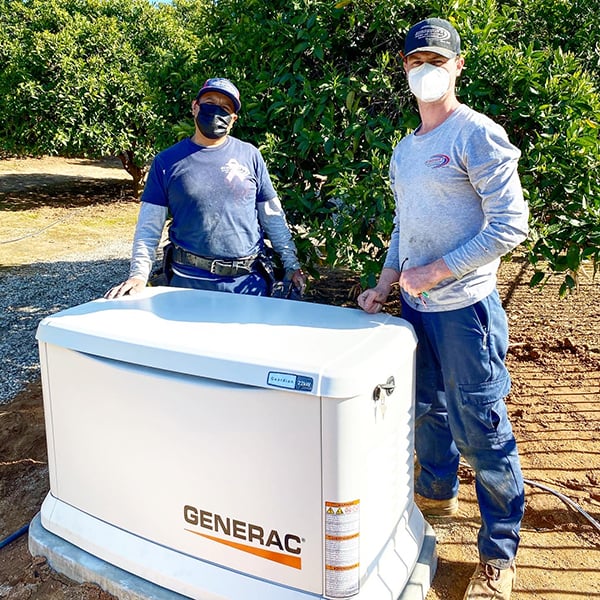 Carlos & Nick w_Generac Install-1