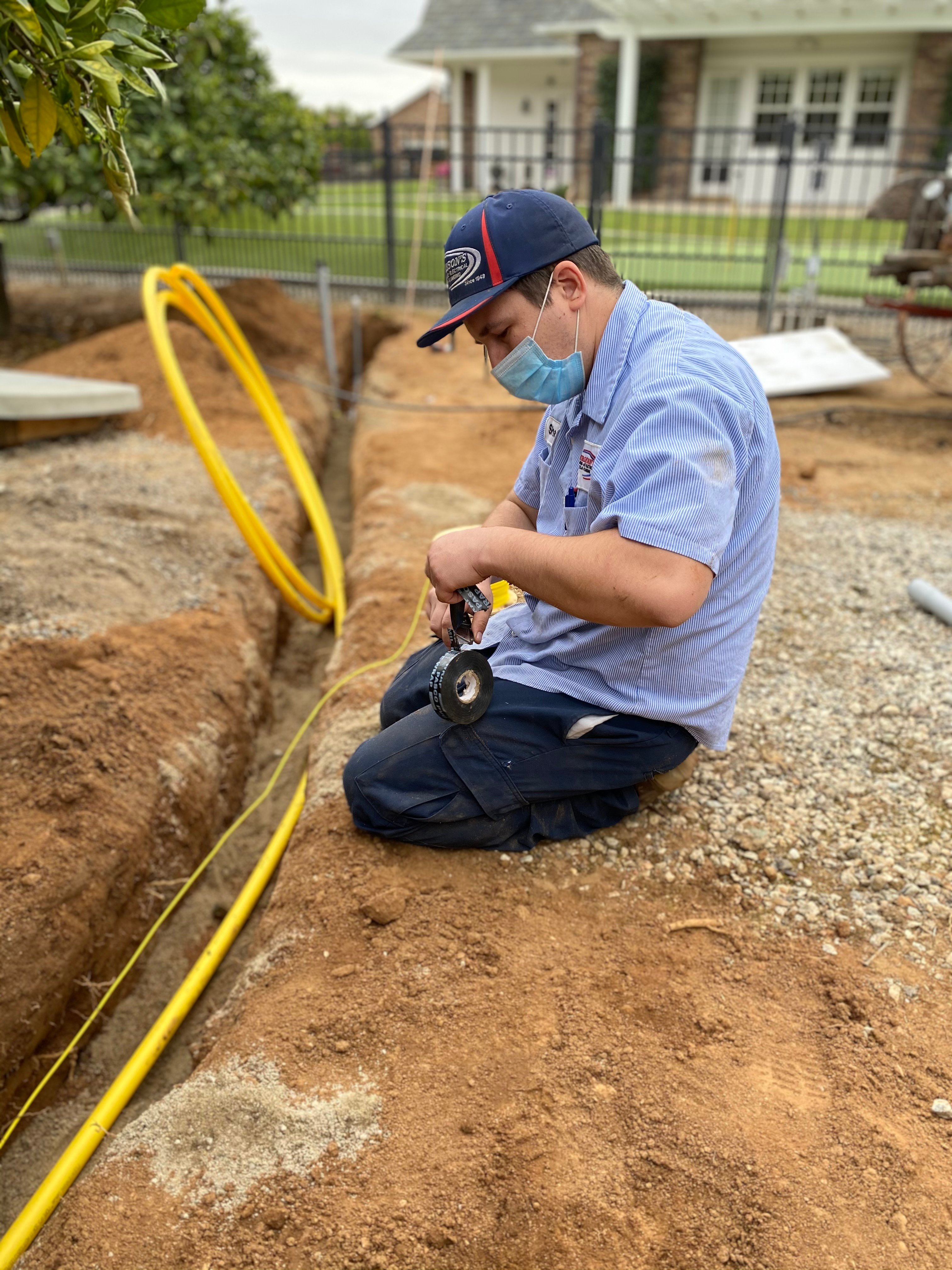 Technician working on installing a gas line