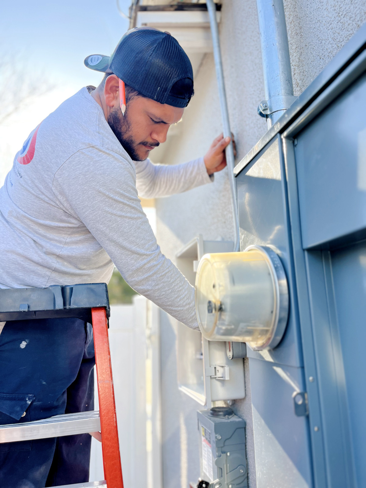 Burgeson's electrician performing maintenance 