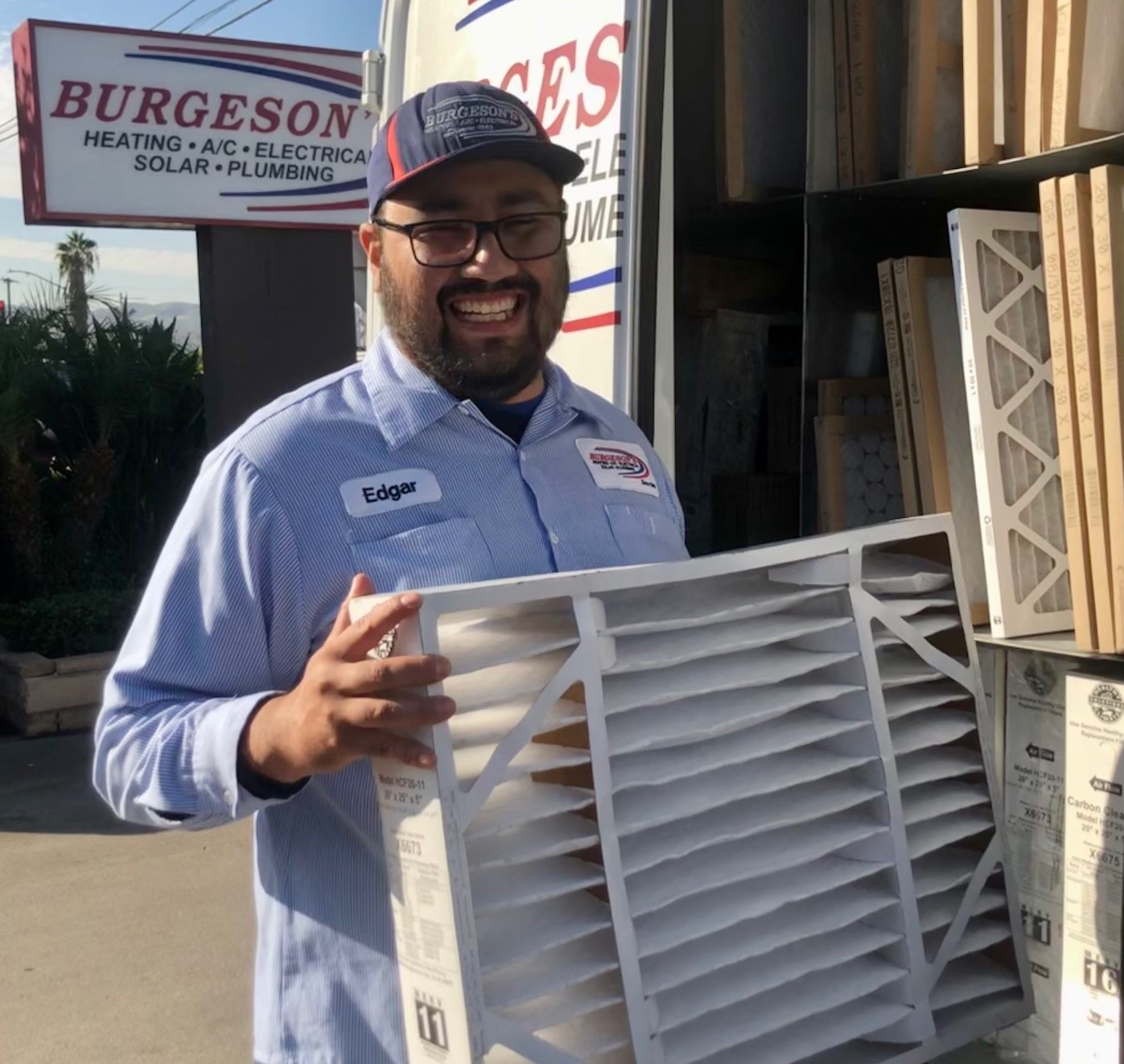 Technician hold a air filter